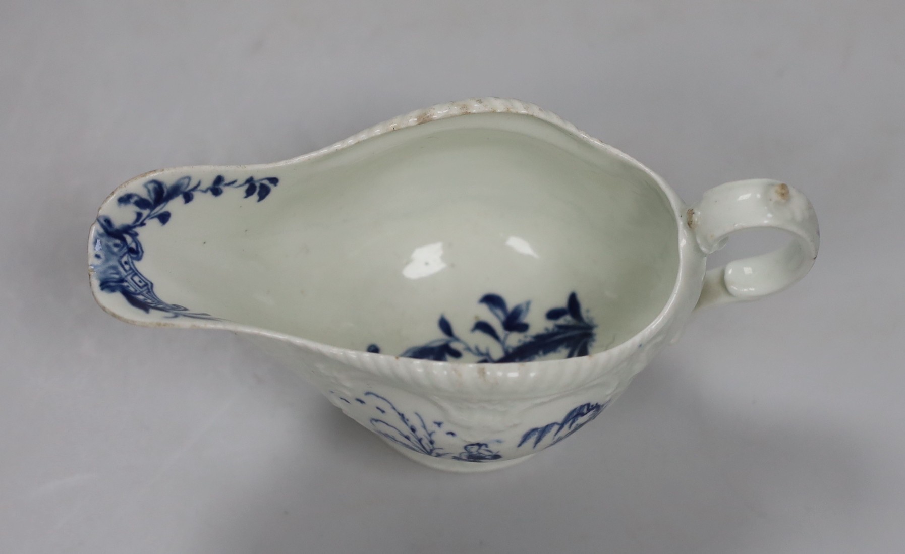 A Worcester ‘fishermen’ pattern sauce boat, 17cm long
